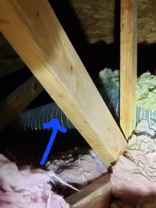 Insulation fallen of duct work in attic.