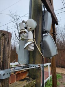 Unprotected light bulbs and wires connecting fixture.